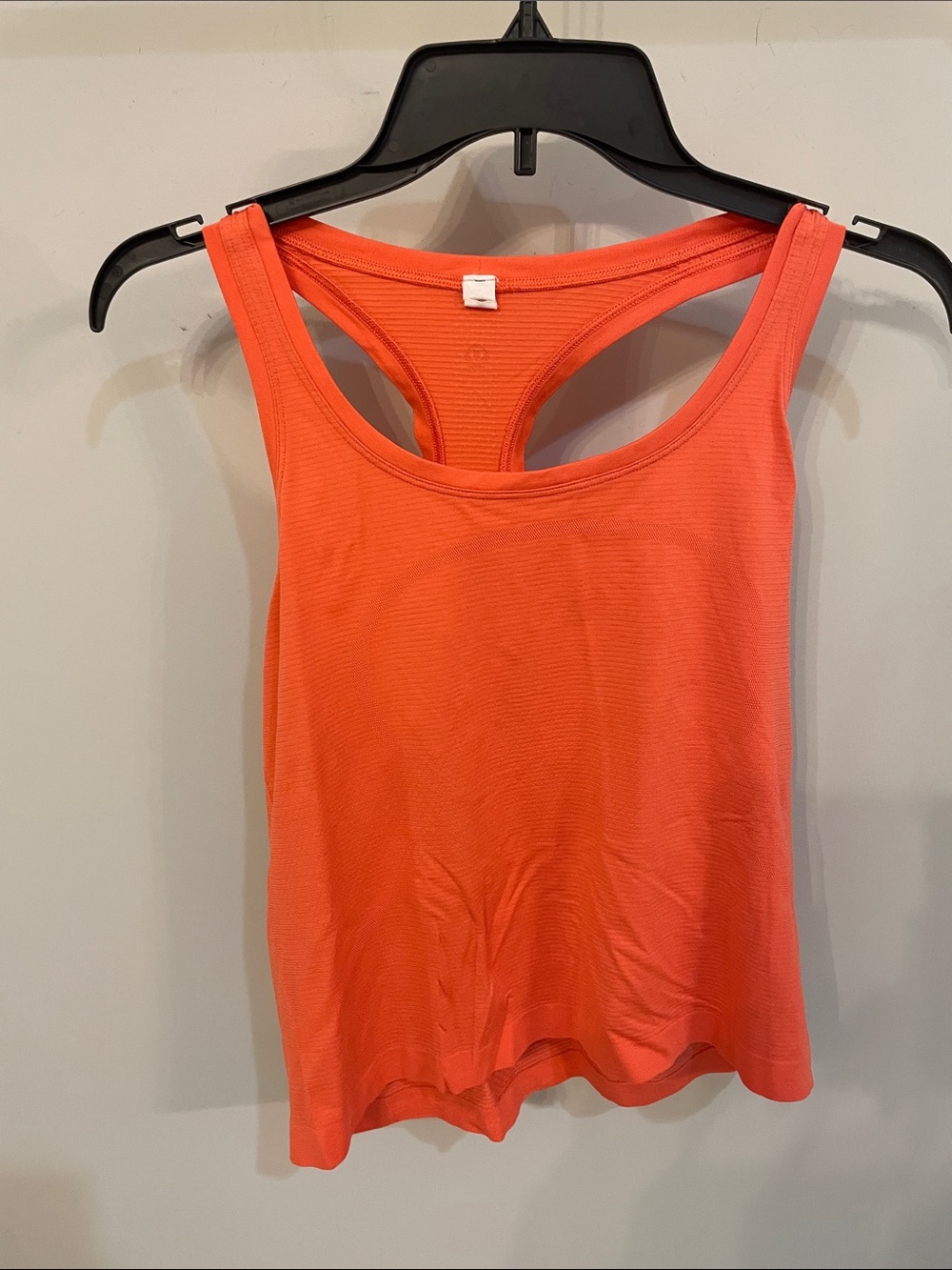Women’s Racerback Tank Top in Orange/coral